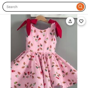 Pink Dress with Red Bow Accents